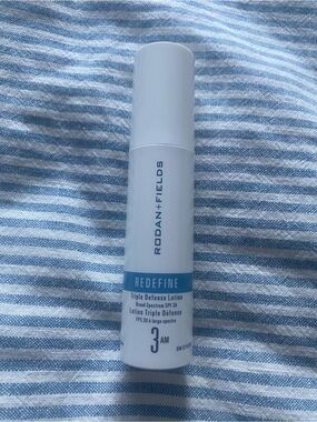 Rodan + Fields White and Blue REDEFINE Triple Defense Lotion SPF 30